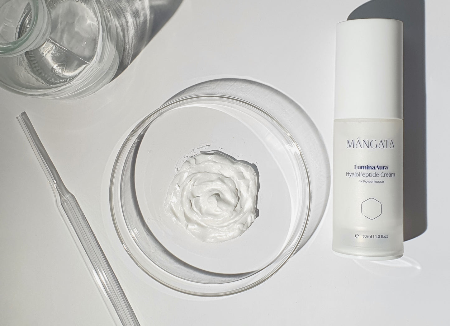 Velvety skin brightening moisturizer in petri dish.
