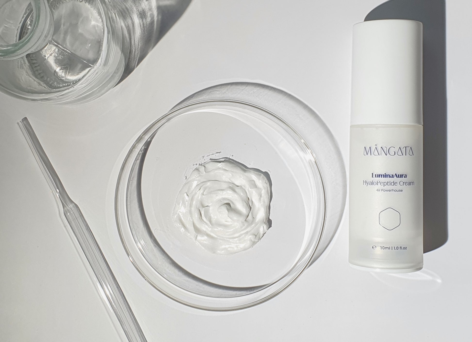 Velvety skin brightening moisturizer in petri dish.